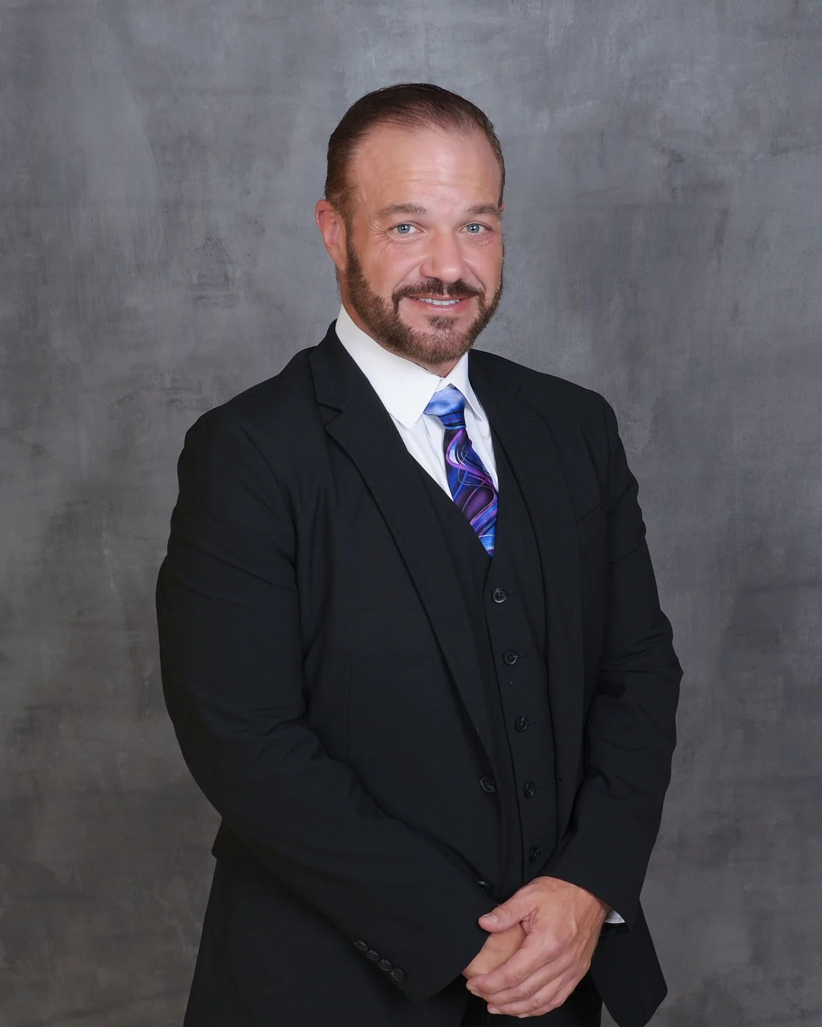Portrait of Lantz Savage in a dark suit